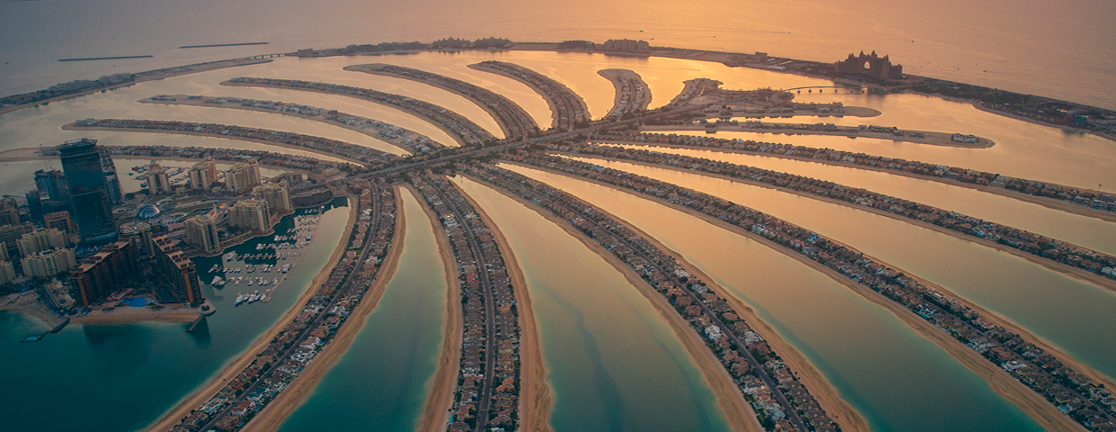 Palm Jumeirah sunset aerial by Nakheel. Not Palm Springs.